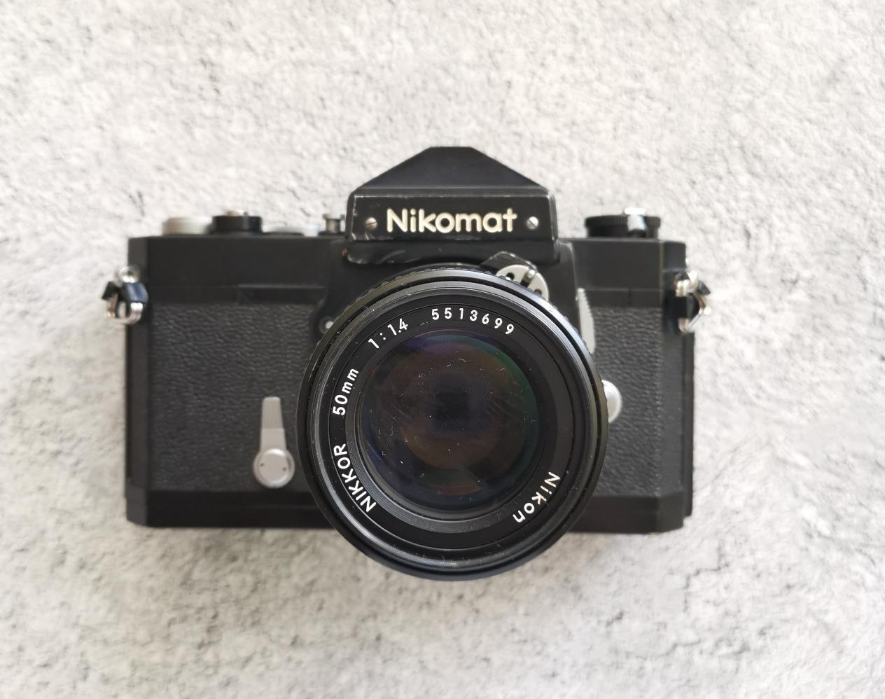 Nikomat + Nikkor-S.C Auto 50 mm/ 1,4 фото №1