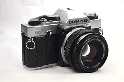 Olympus OMG + Olymps OM-System Zuiko Auto-S 50 mm f/1.8 фото №1