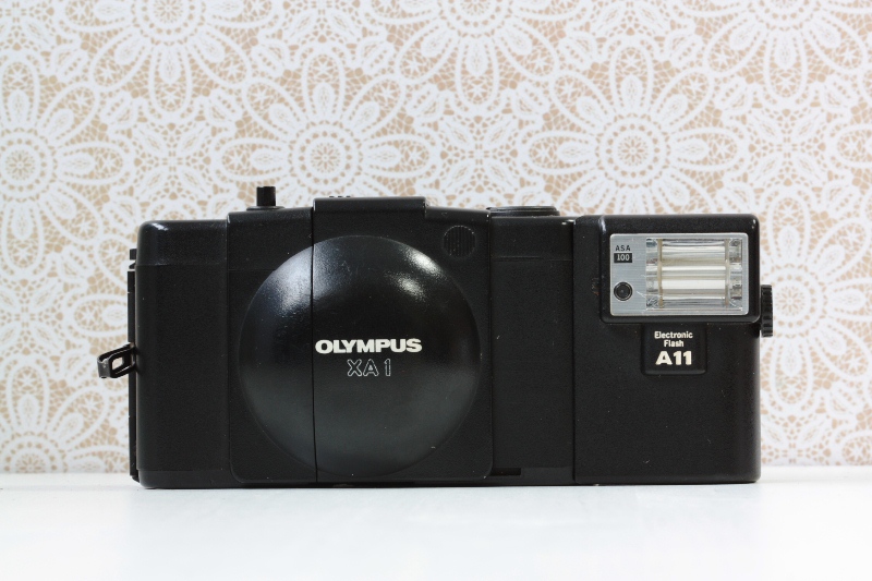 Olympus XA1 + вспышка фото №1