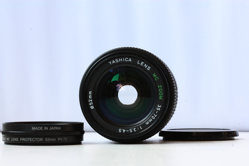 Yashica 109 + Yashica Lens MC Zoom 35-70 mm f/3.5-4.5 фото №3