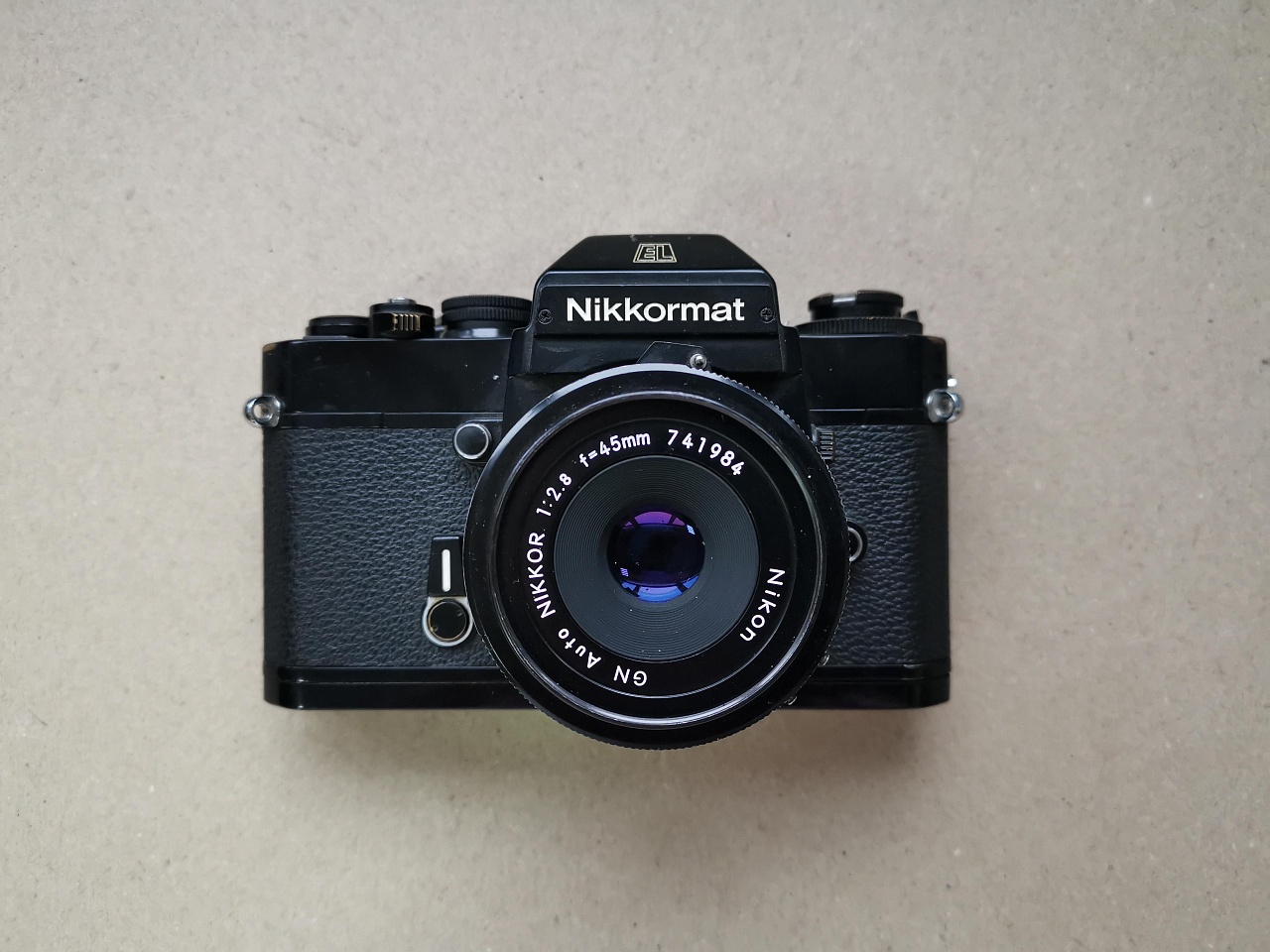 Nikomat + Nikon Nikkor 45:1.2.8 фото №1