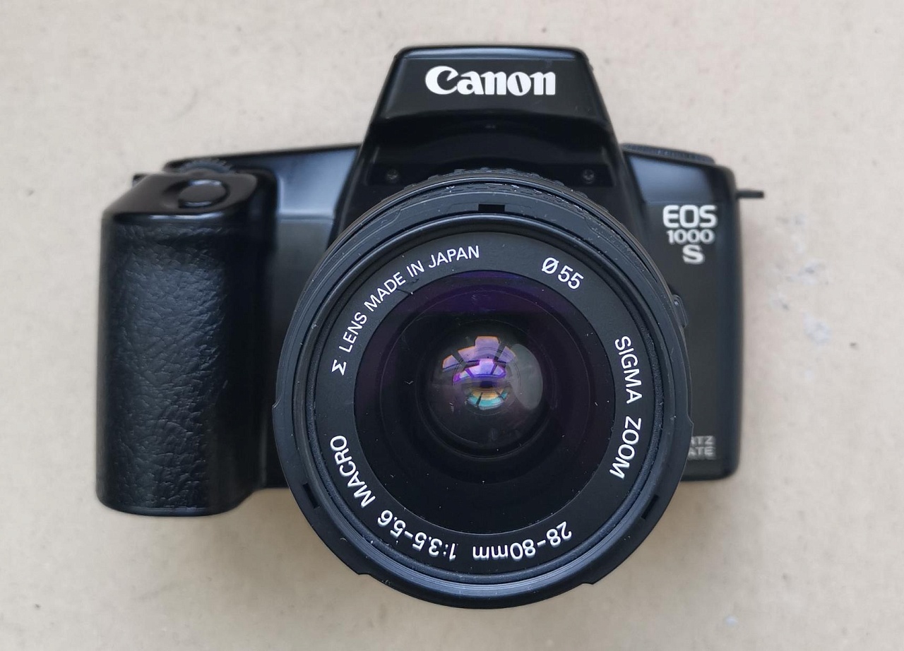Canon 1000s + Sigma Zoom 28-80/ 3,5-5,6 фото №1