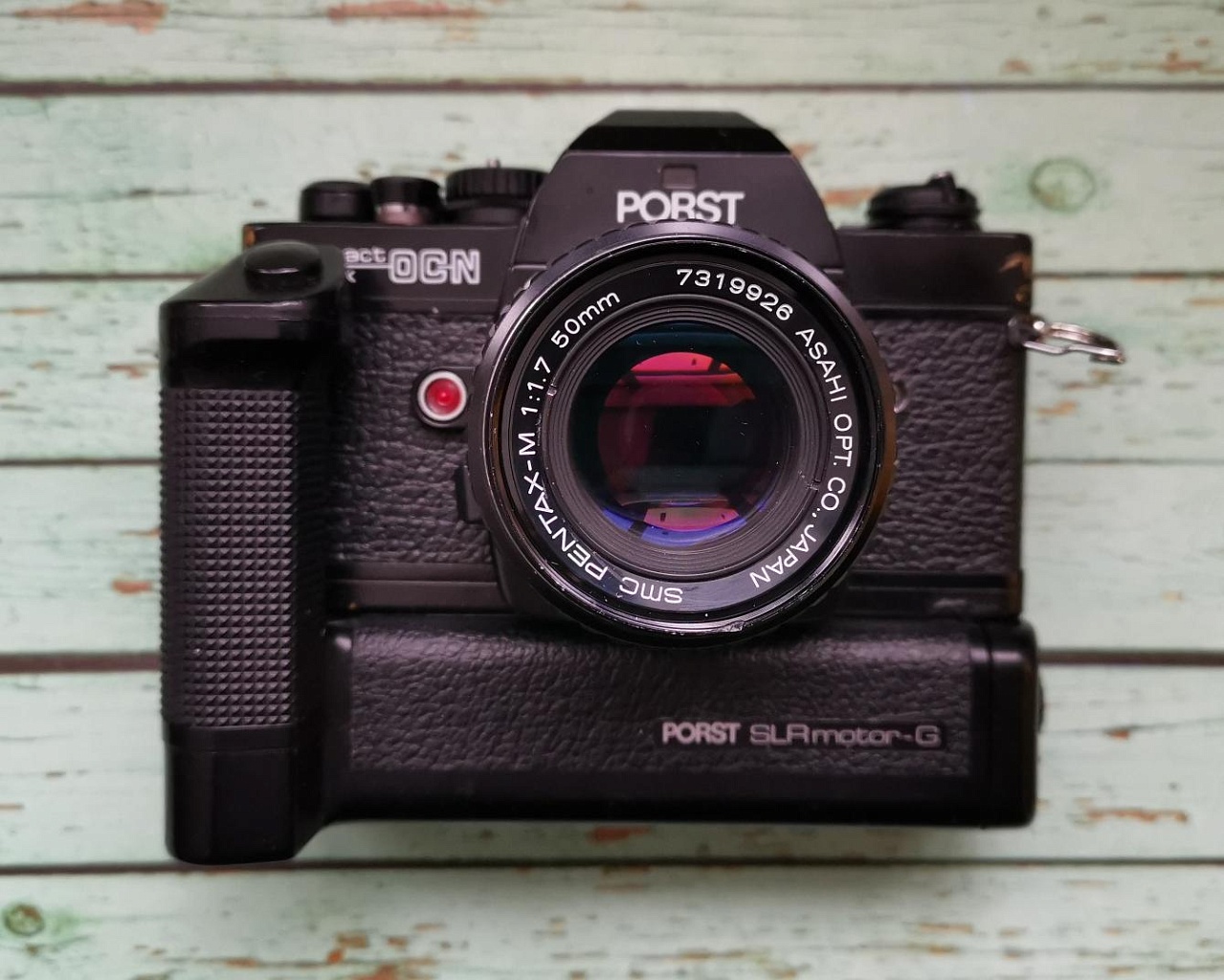 Porst compact reflex OC-N + SMC Pentax-A 50 mm f/1.7 + Моторная ручка фото №1