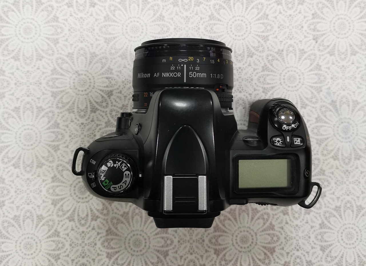Nikon f75 +Nikkor 50 1.8 фото №2