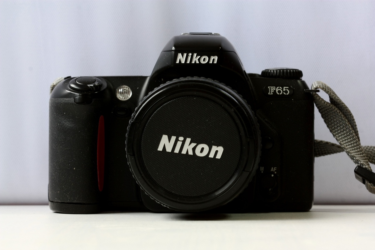 Nikon f65 + Nikkor 35-80 mm (черный) фото №1