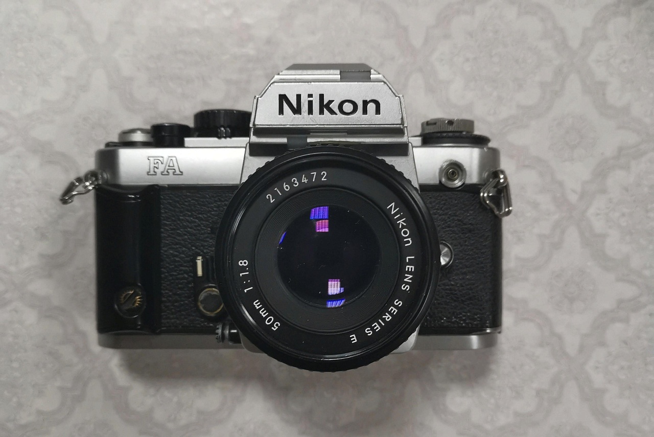 Nikon FA + Nikon lens series e 50 mm f/1.8 фото №1