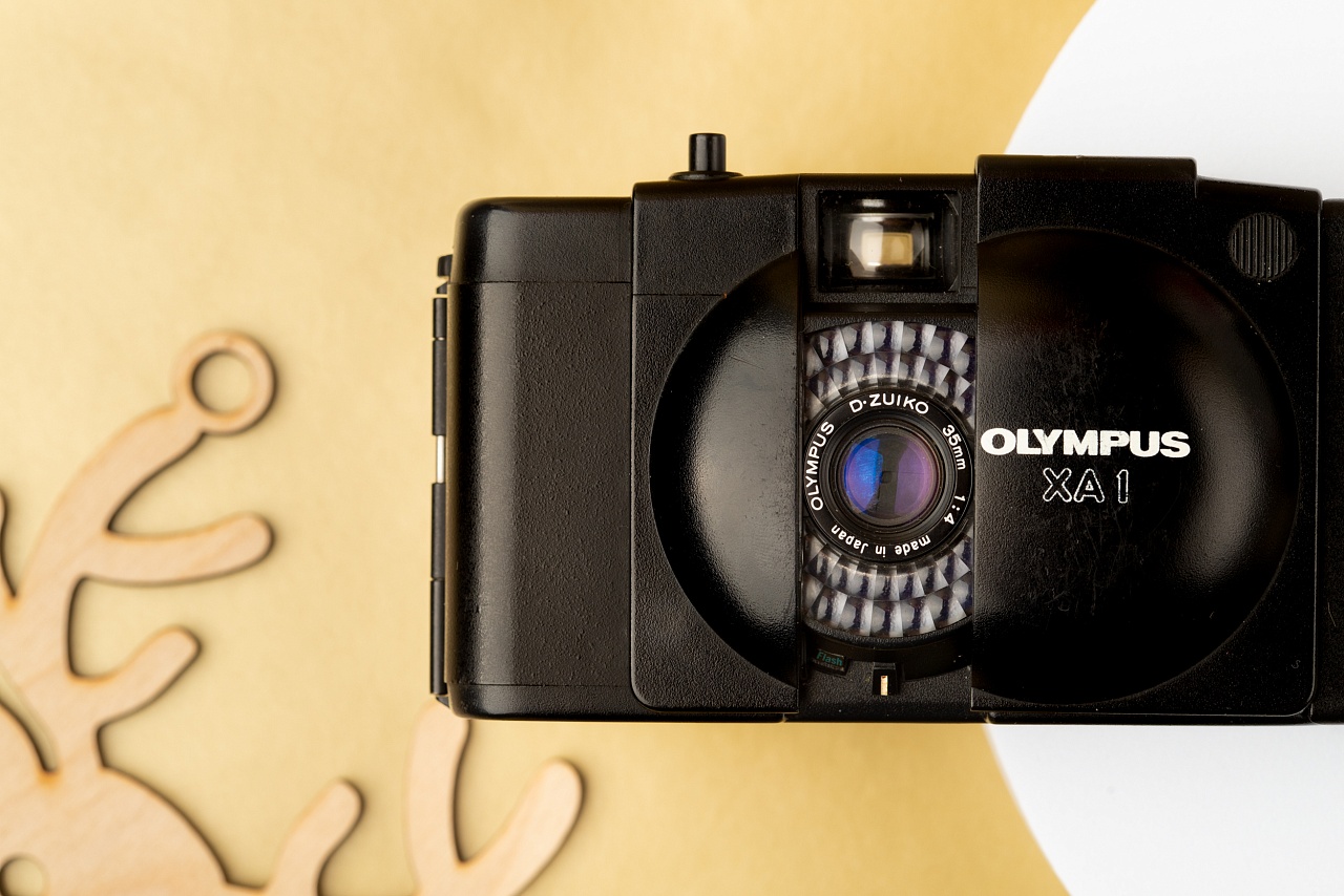 Подарочная коробка: Olympus XA1 +вспышка + 2 пленки фото №3