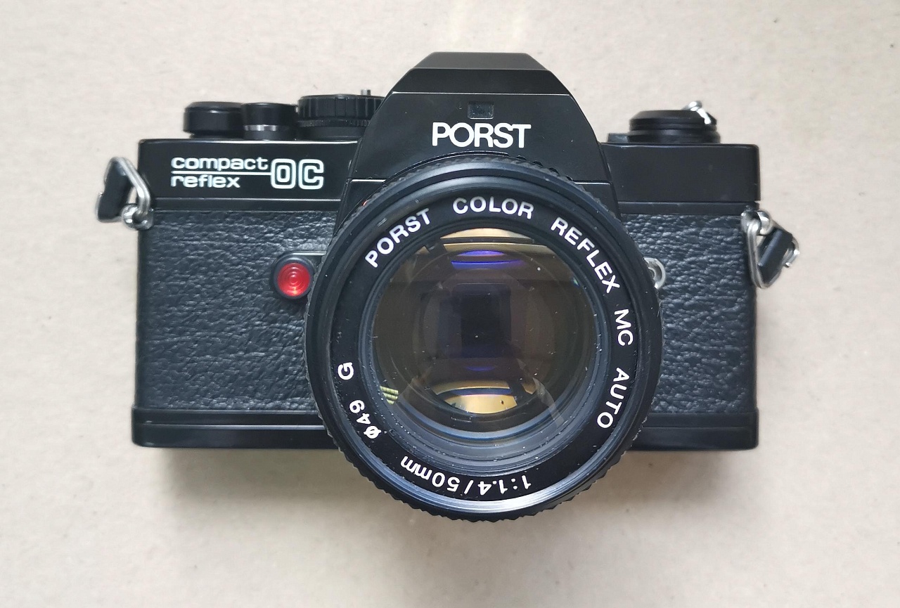 Porst compact reflex oc + Porst color reflex mc auto 50 mm f/1.4 g фото №1
