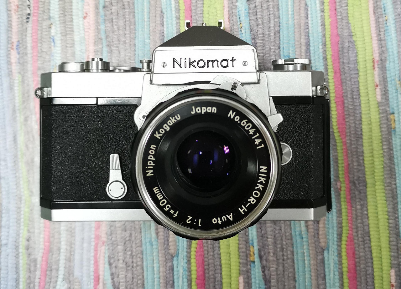 Nikomat + Nikon Nikkor 50mm f/2 фото №1