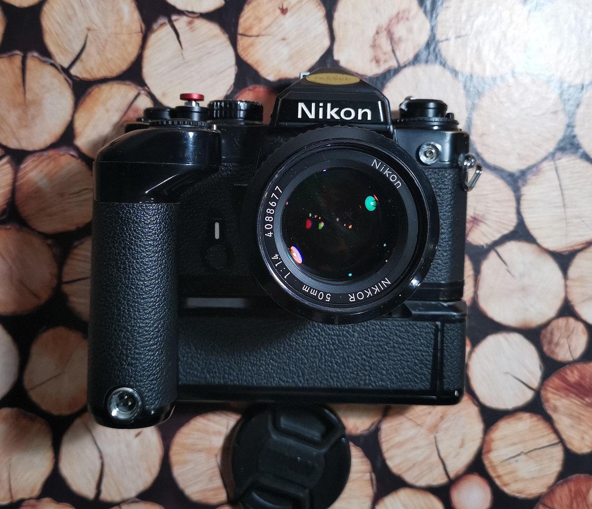 Nikon FE + Nikon Nikkor 50 mm F/1.4 + Батарейная ручка фото №1