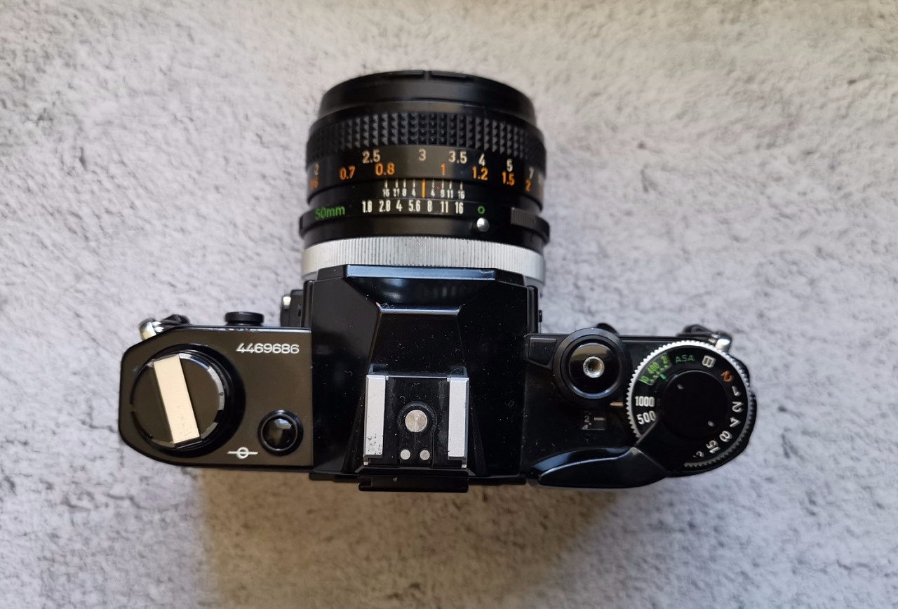 Canon ae-1 + Canon lens fd 50 mm f/1.8 фото №2