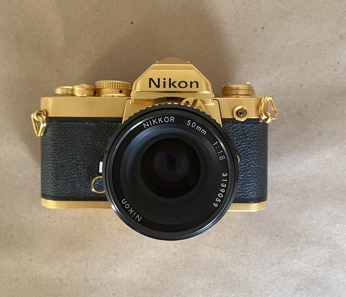 Nikon FM + Nikkor 50 1:1.8 GOLD SET фото №1