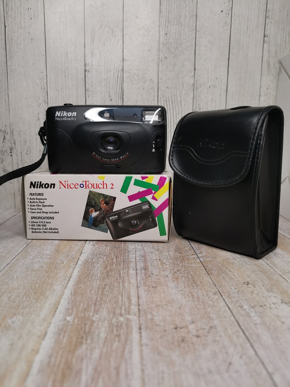 Nikon Nice Touch 2/ Nikon EF 100 фото №1