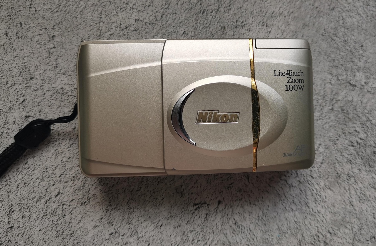 Nikon Lite Touch 100W (уценка) фото №1