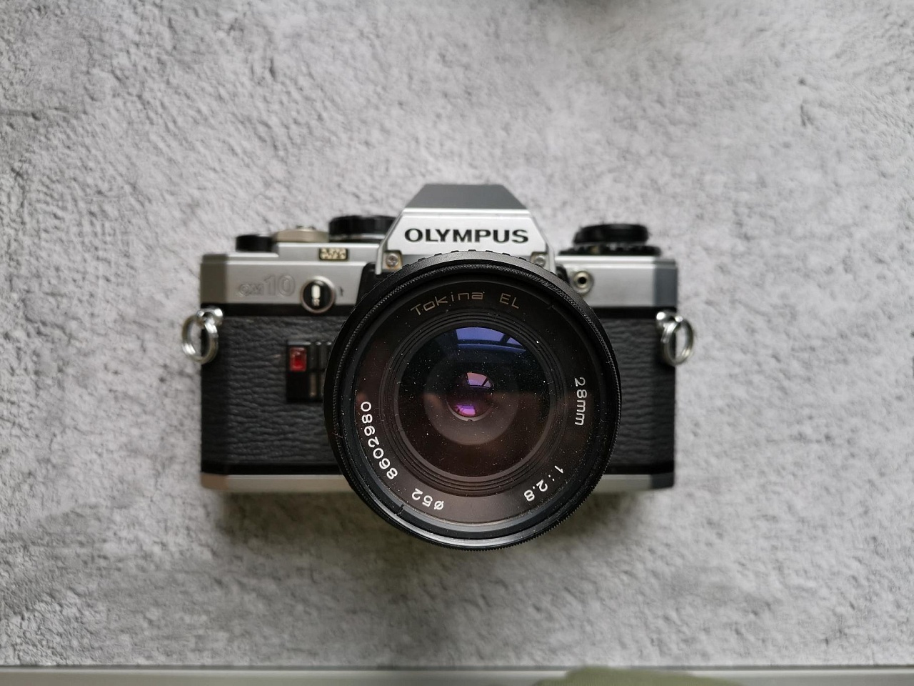 Olympus OM 10+ Tokina El 28mm 2.8 фото №1