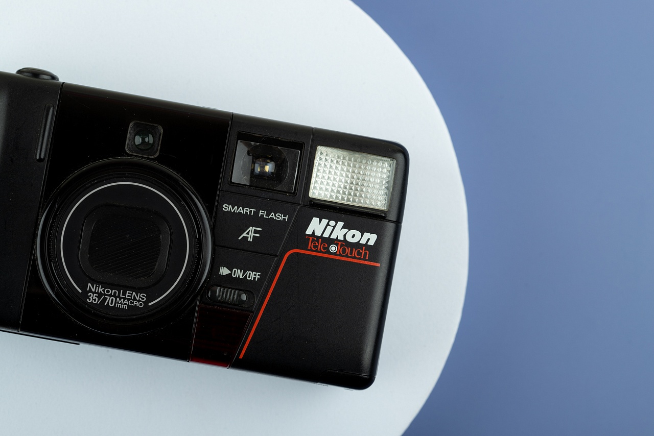 Подарочная коробка: Nikon Tele Touch AF + 2 пленки фото №1