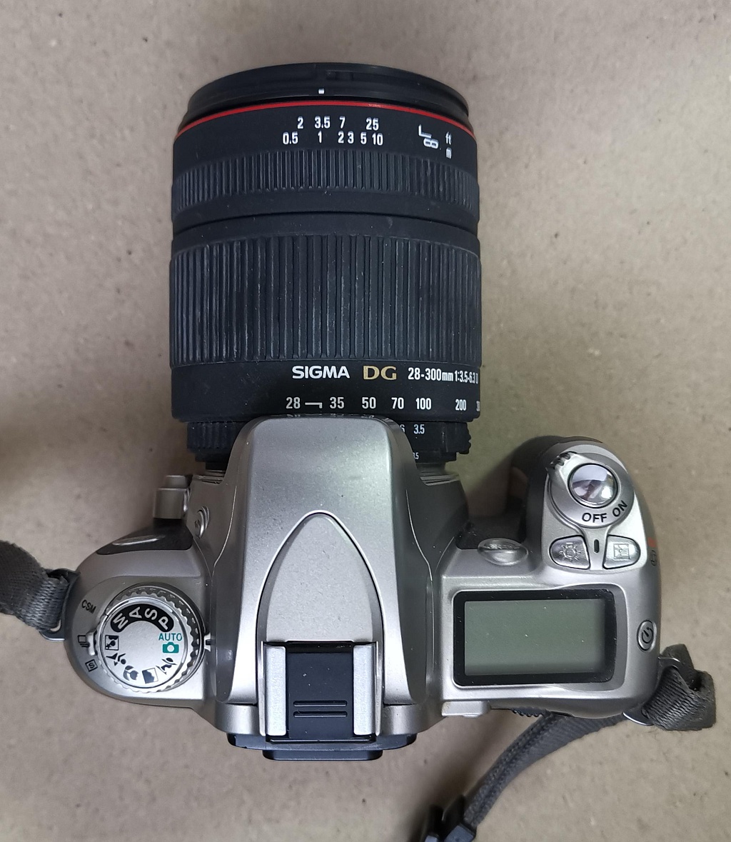 Nikon f65 white + Sigma zoom 28-300 mm f/3.5-6.3 dg macro фото №2