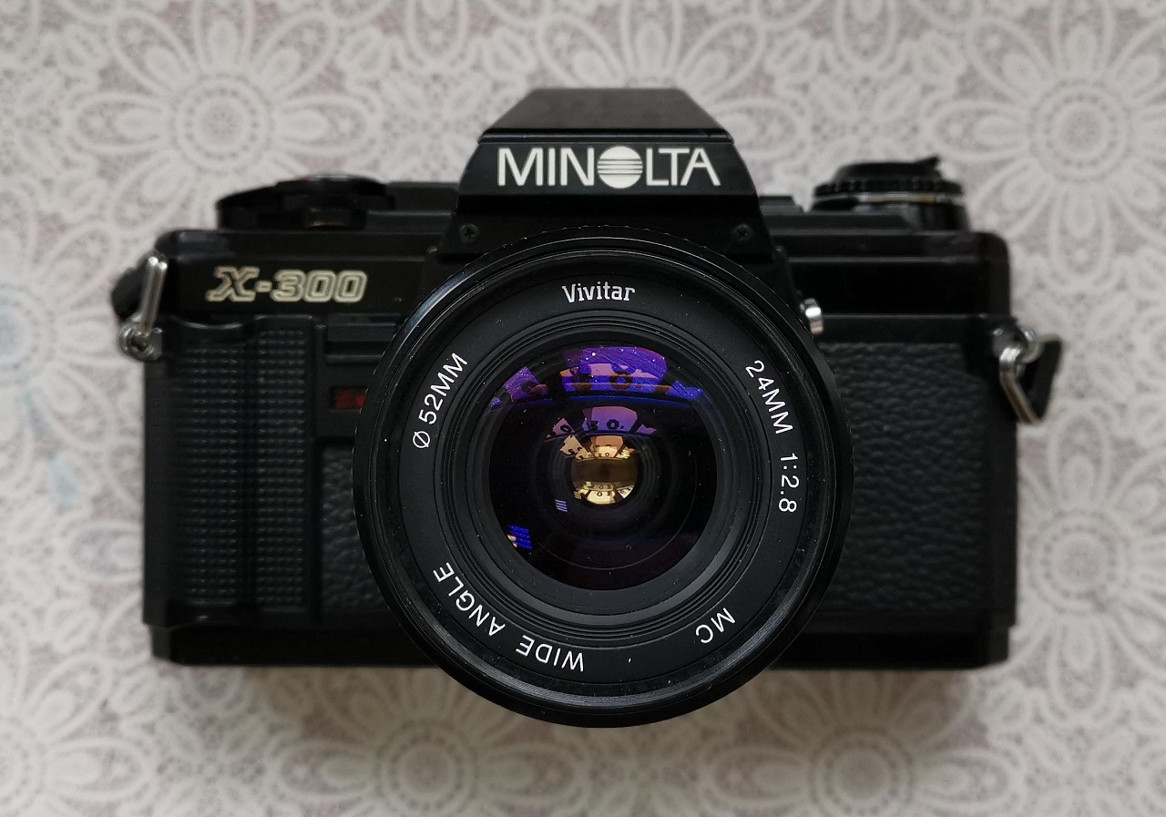 Minolta x-300 + Vivitar mc angle 24 mm f/2.8 фото №1