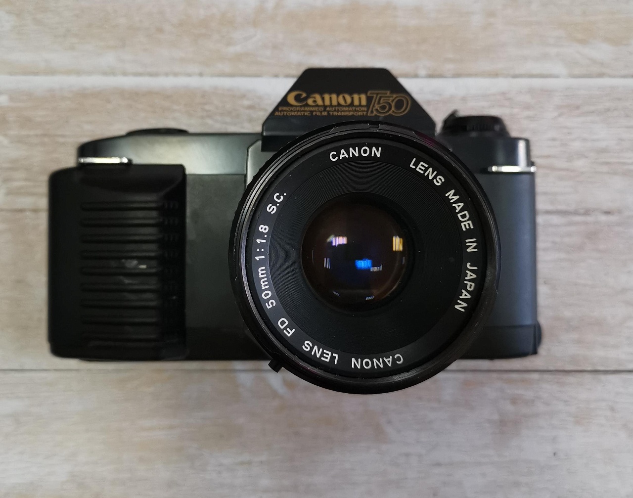 Canon T50 + Canon FD 50 mm f/1.8 S.C. фото №1