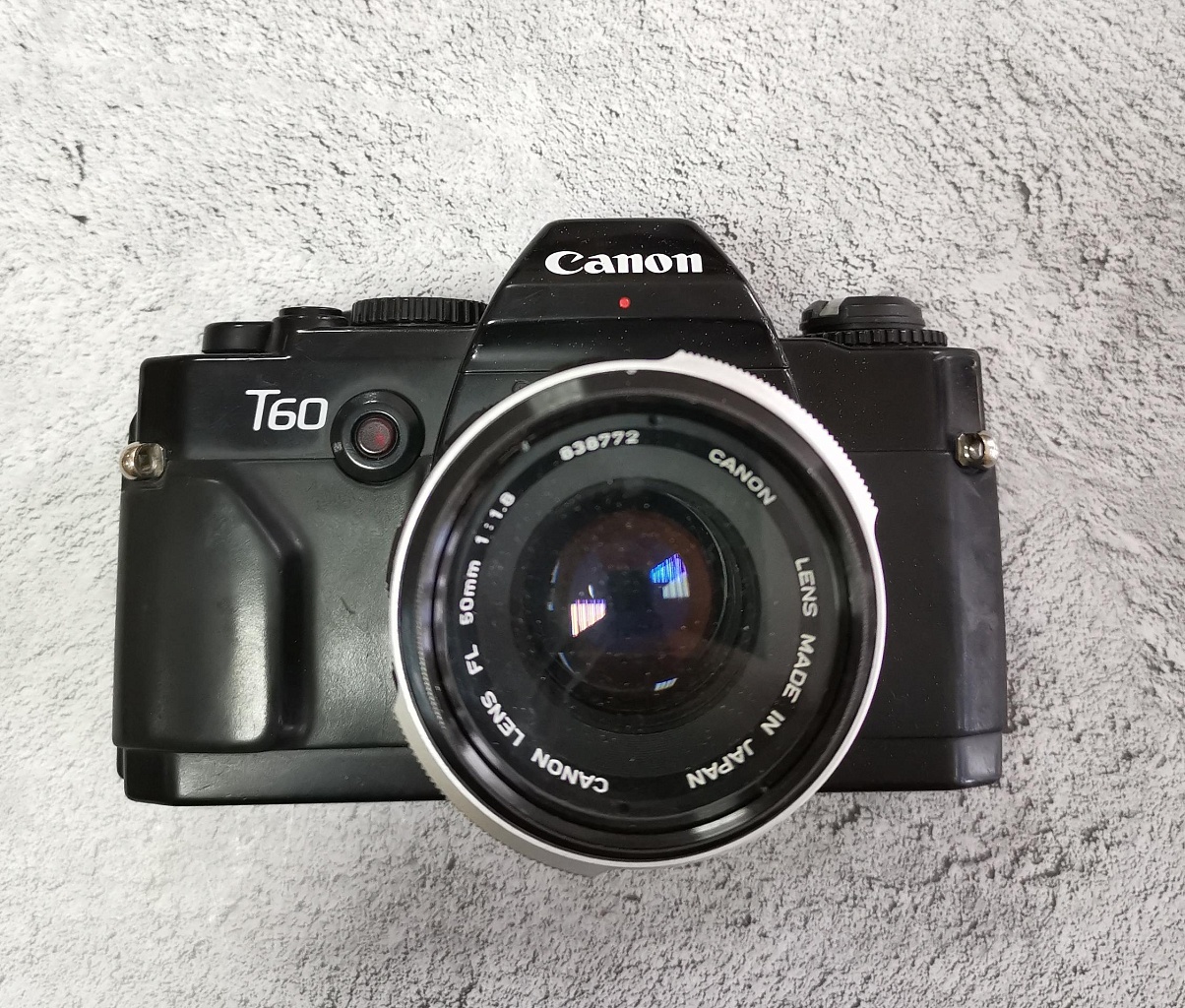 Canon T 60 + Canon FL 50/1,8 фото №1