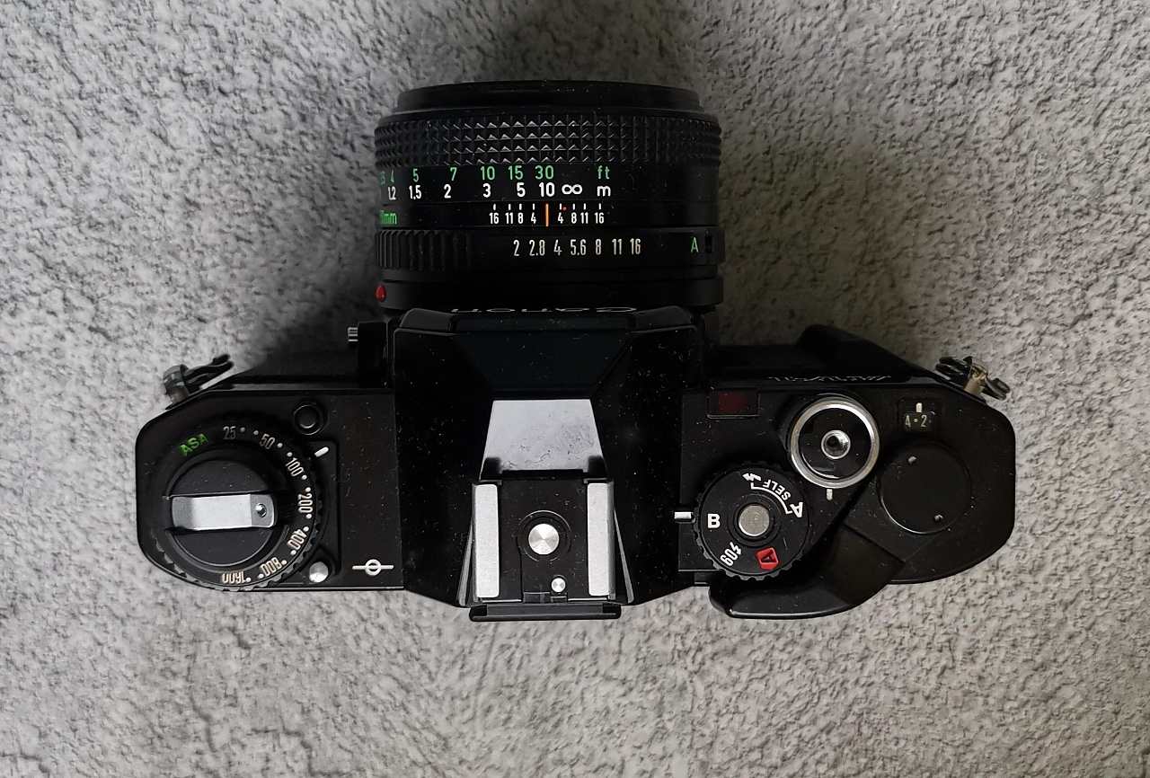 Canon AV-1 (Black) + Canon FD 50 mm F/2 фото №2