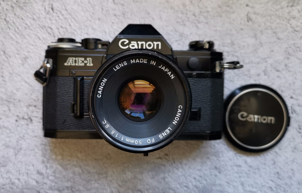 Canon ae-1 + Canon lens fd 50 mm f/1.8 фото №1